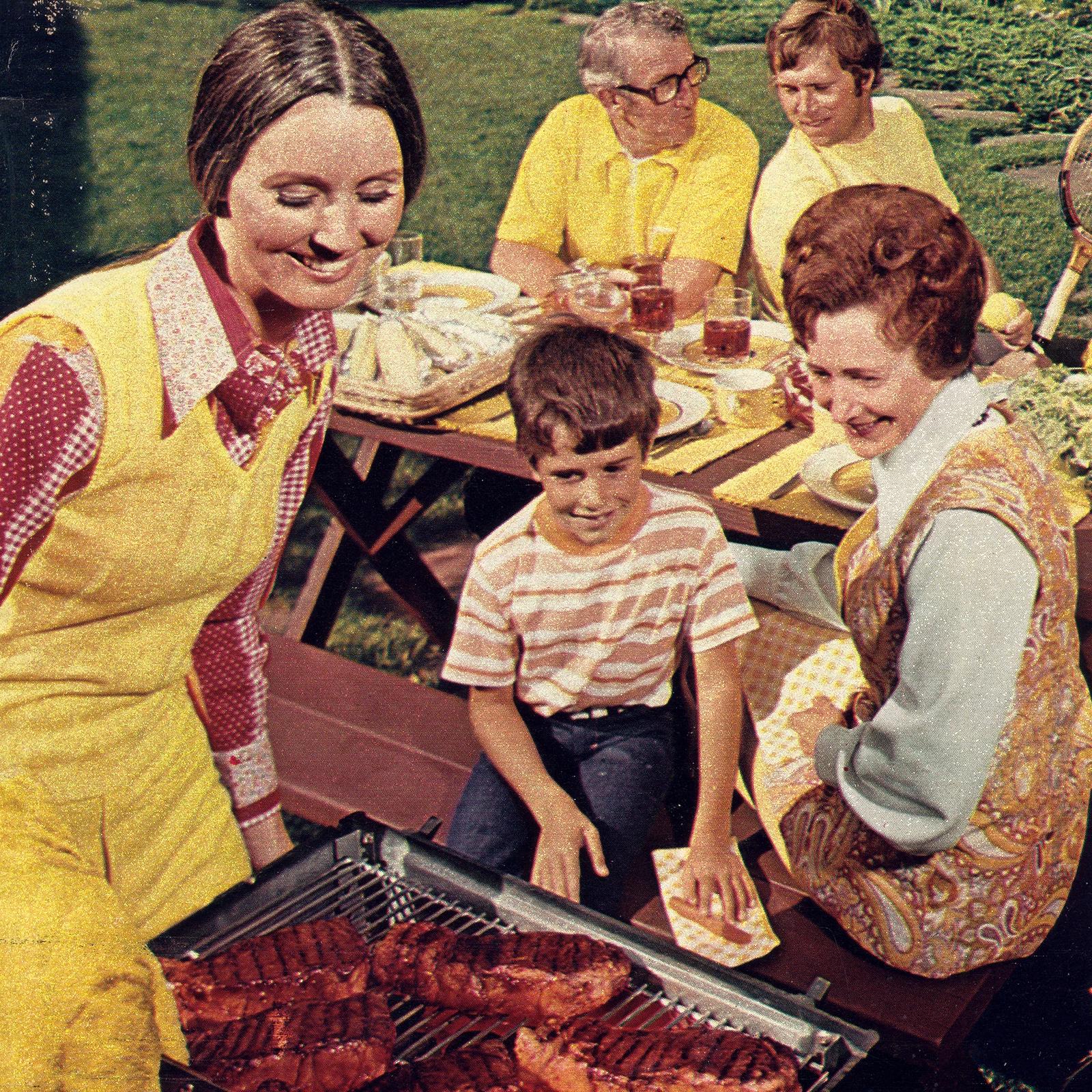 Two Women and a child enjoying Omaha Steaks circa the 1960st