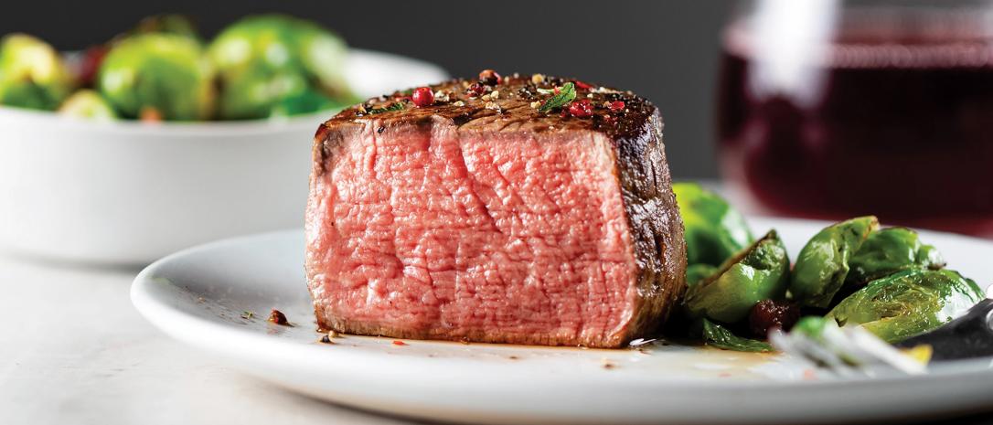 Omaha Steaks filet mignon plated with sides